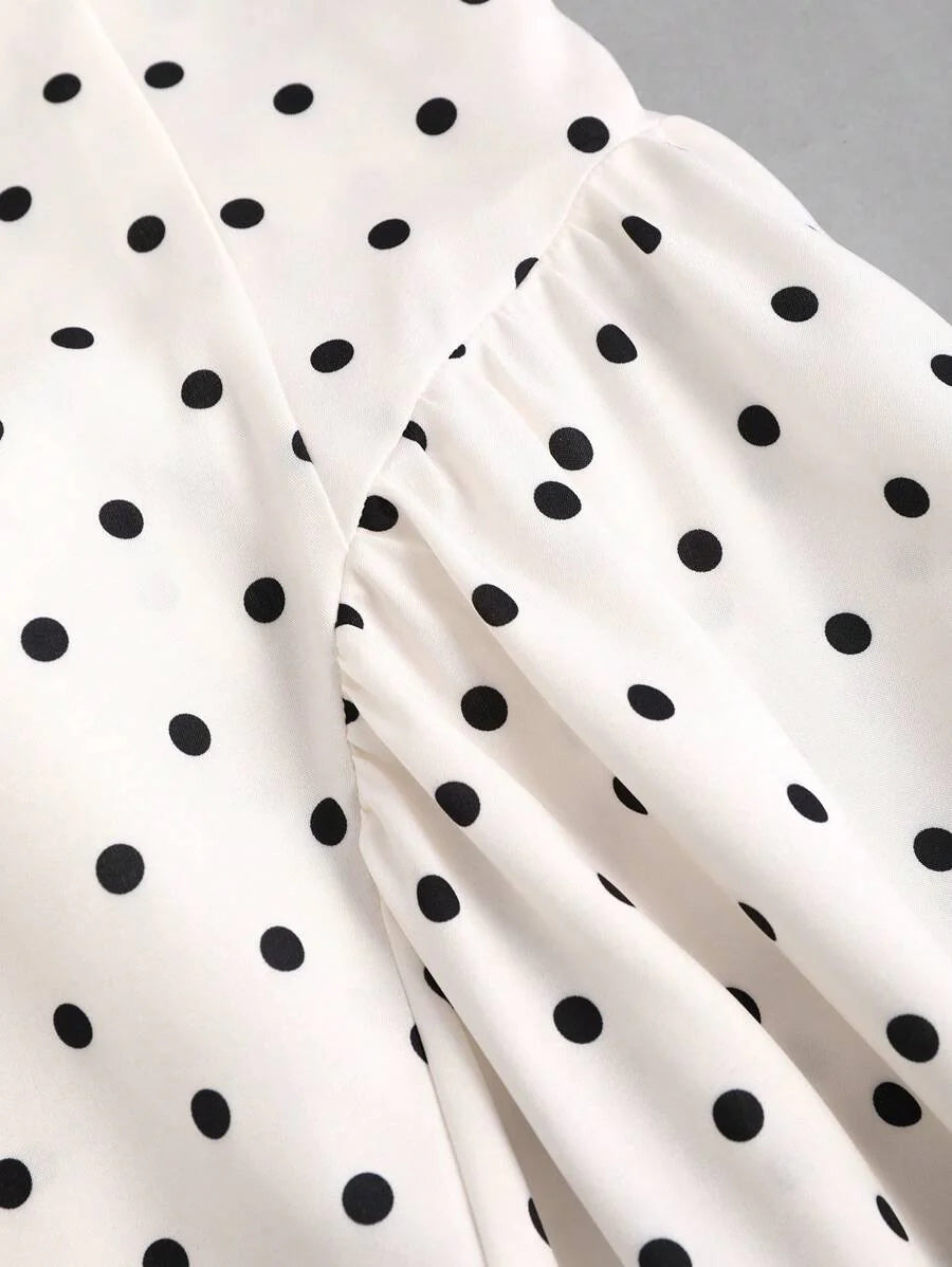 Dames mini zomerjurk mouwloos met stippen en V-hals