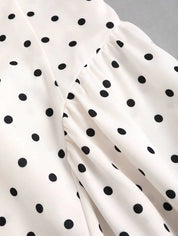 Dames mini zomerjurk mouwloos met stippen en V-hals
