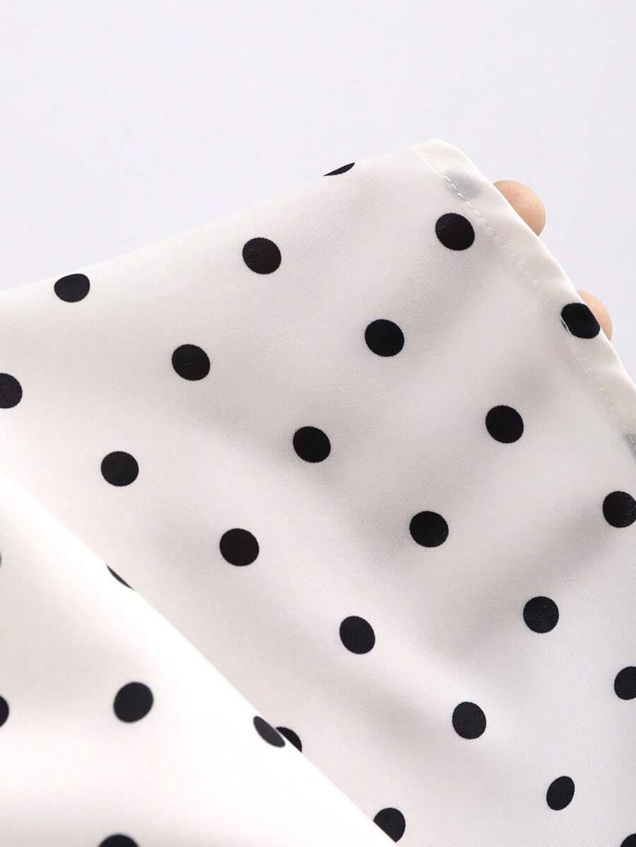 Dames mini zomerjurk mouwloos met stippen en V-hals