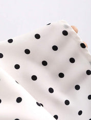 Dames mini zomerjurk mouwloos met stippen en V-hals