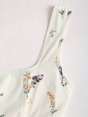 Dames mini zomerjurk mouwloos met stippen en V-hals