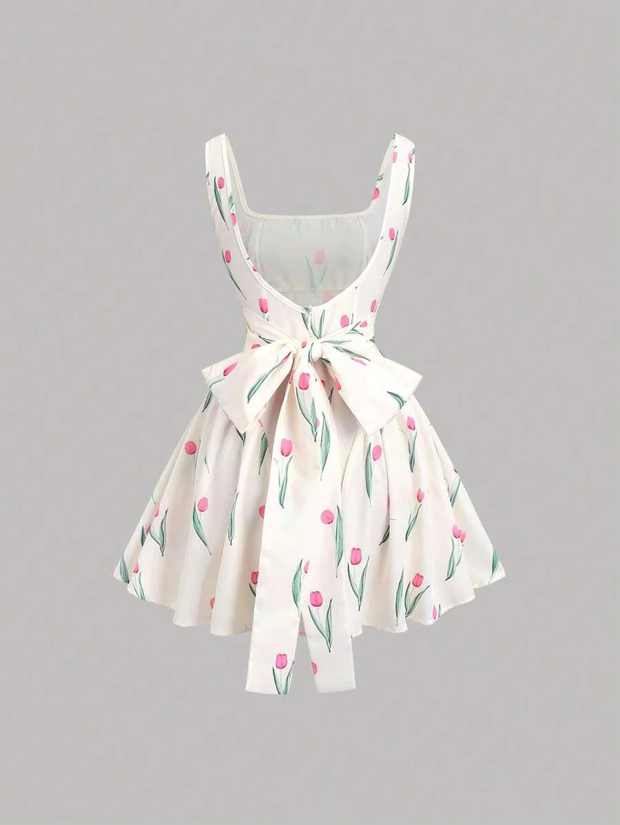 Dames mini zomerjurk mouwloos met stippen en V-hals