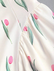 Dames mini zomerjurk mouwloos met stippen en V-hals