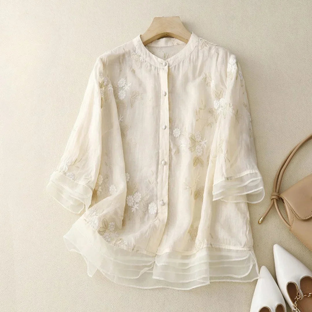 Dames blouse met bloemenborduursels en wijde pasvorm