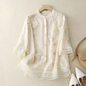 Dames blouse met bloemenborduursels en wijde pasvorm