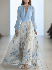 Dames zomerjurk blauw en bloemenprint met diepe v-hals