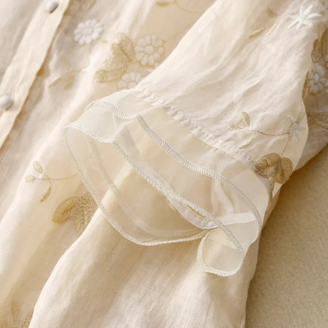 Dames blouse met bloemenborduursels en wijde pasvorm