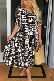 Dames zomerjurk midi met korte mouwen en ronde hals