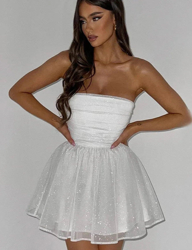 Feestelijke dames glitterjurk | Strapless en kort