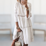 Women's summer dress with lace details and cutouts