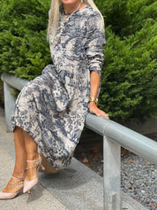Dames midi jurk met vintage print en lange mouwen