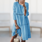 Women's summer dress with lace details and cutouts