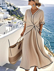 Dames zomerjurk - Knoopdetail met losse pasvorm en korte mouwen