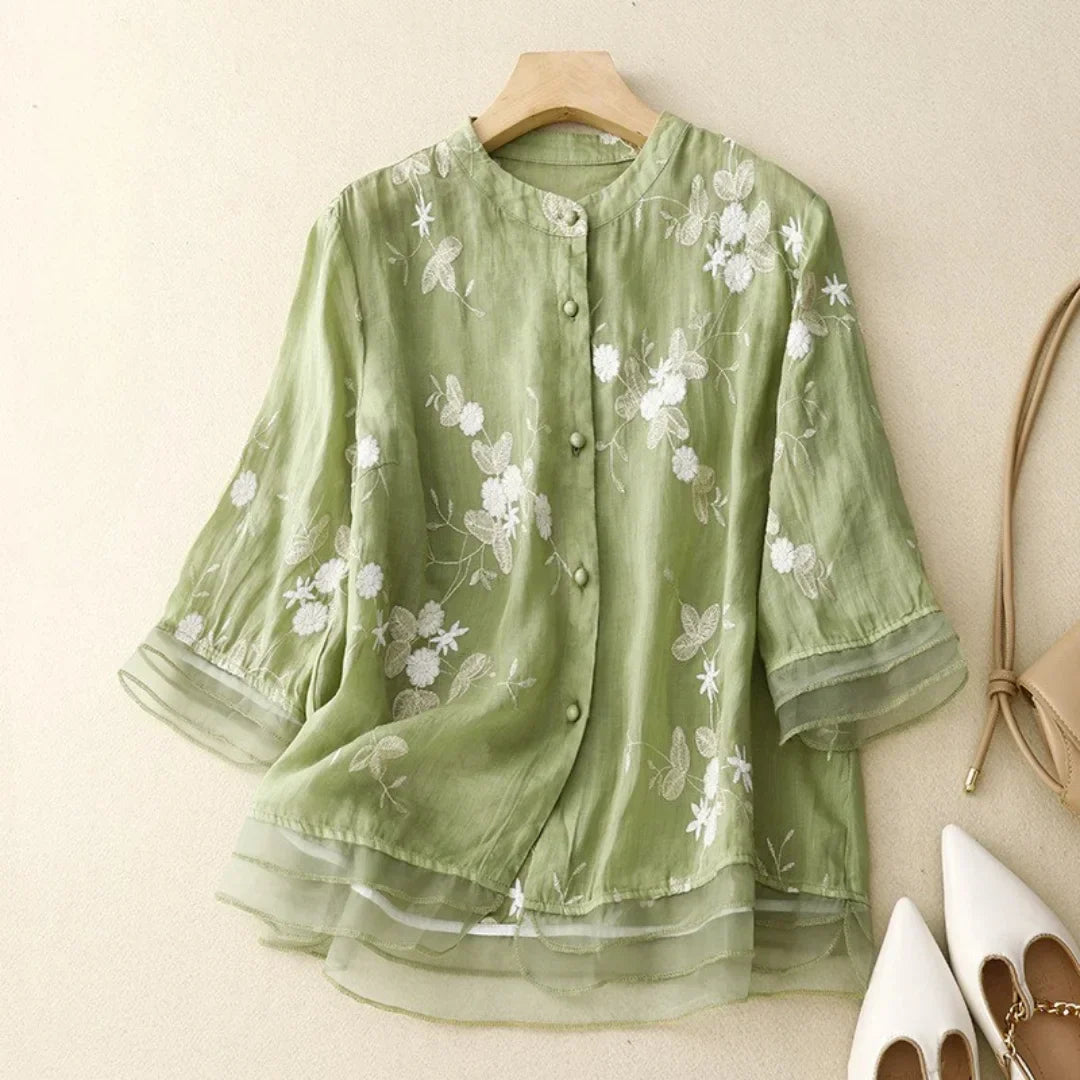 Women's blouse with floral embroidery and loose fit