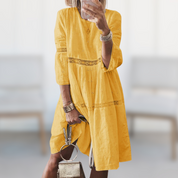 Women's summer dress with lace details and cutouts