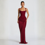 Women's evening dress with square neckline and pleated maxi silhouette