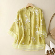 Dames blouse met bloemenborduursels en wijde pasvorm