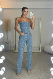 Dames zwarte glitter jumpsuit met mouwloze top en wijde pijpen