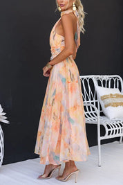 Dames zomerjurk maxi met halterneck en open rug - Oranje met print