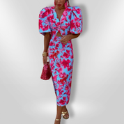 Dames zomerjurk met pofmouwen en twist detail