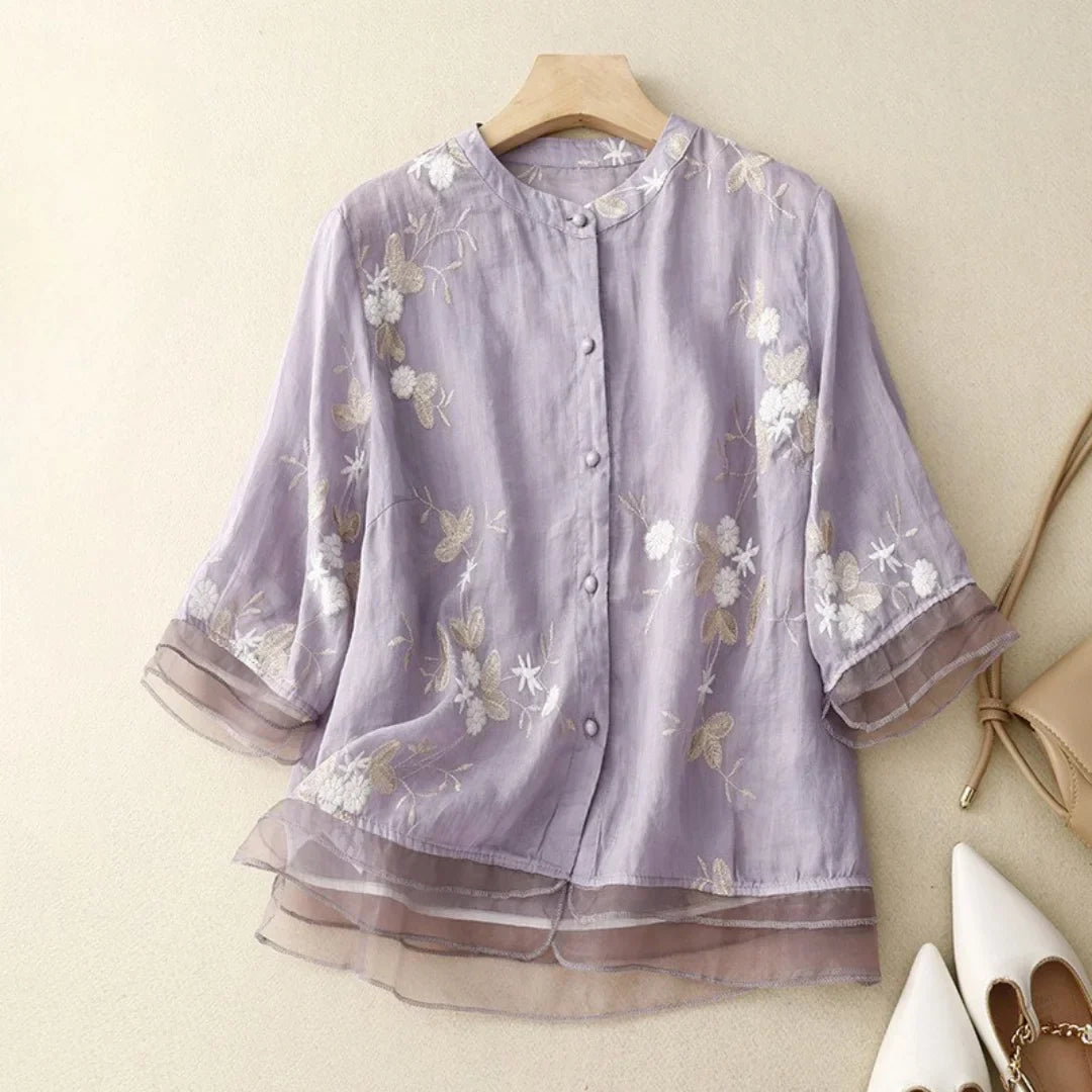 Women's blouse with floral embroidery and loose fit