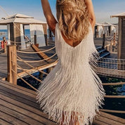 Dames cocktailjurk met franjes boven de knie