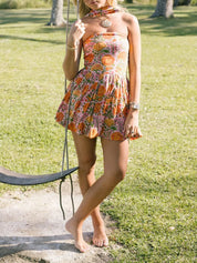 Dames zomerjurk met halternek en bloemenprint mini