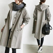 Damesjas met capuchon en knopen | Trenchcoat
