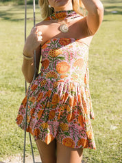 Dames zomerjurk met halternek en bloemenprint mini