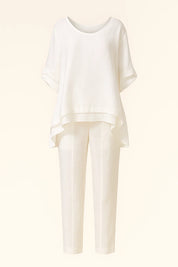 Women's white two-piece set with shirt and pants