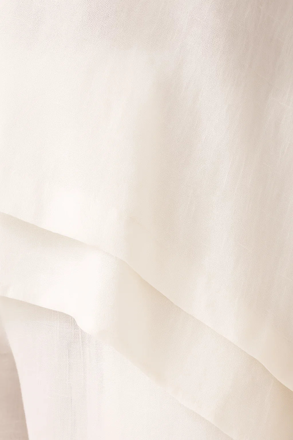 Women's white two-piece set with shirt and pants