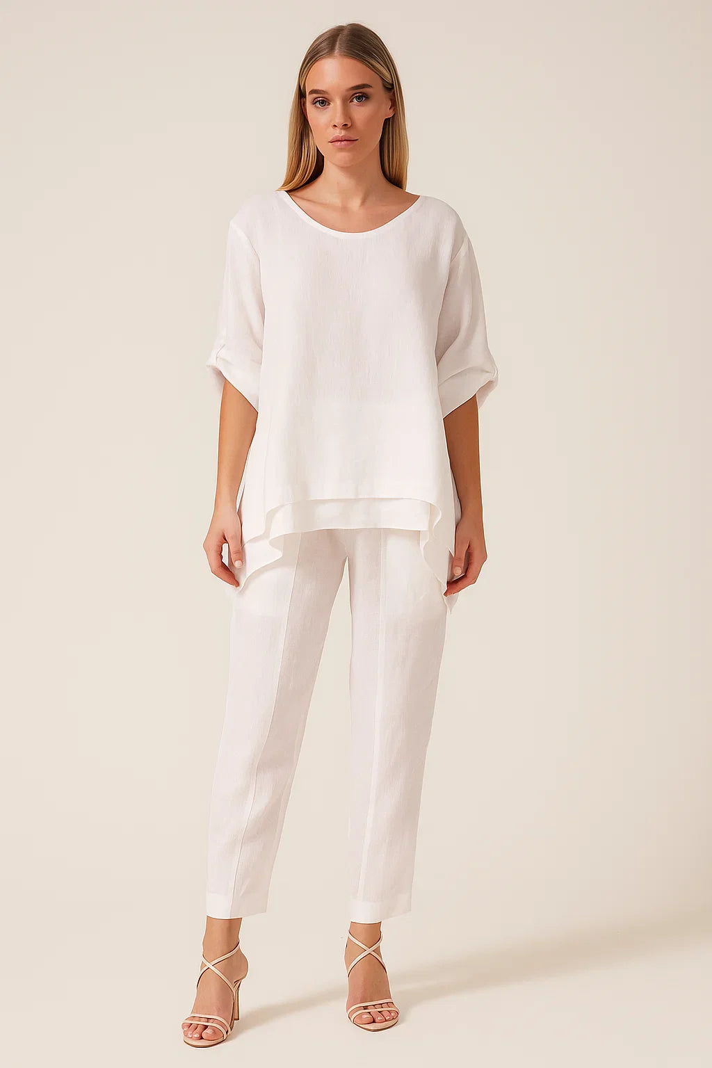 Women's white two-piece set with shirt and pants