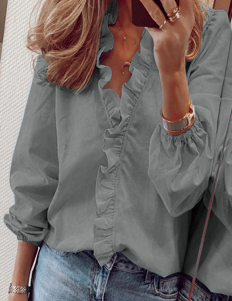 Dames blouse | V-hals met volantdetails en lange mouwen