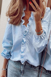 Dames blouse | V-hals met volantdetails en lange mouwen