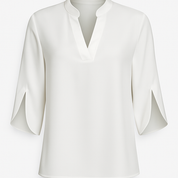 Ladies blouse with cut-out neck and split sleeves