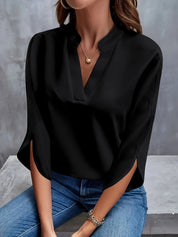 Ladies blouse with cut-out neck and split sleeves