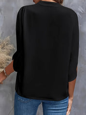 Ladies blouse with cut-out neck and split sleeves