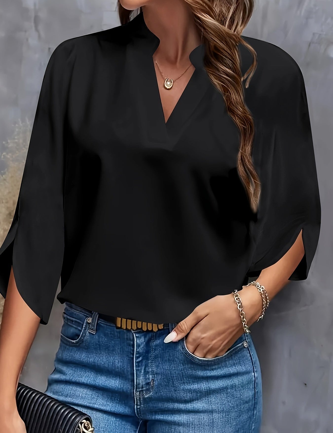 Ladies blouse with cut-out neck and split sleeves
