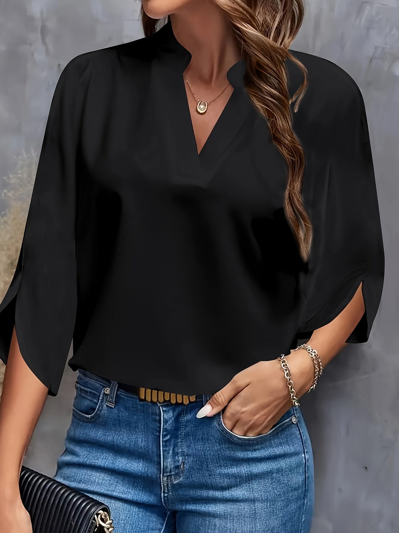 Ladies blouse with cut-out neck and split sleeves