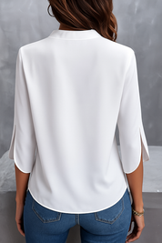 Ladies blouse with cut-out neck and split sleeves