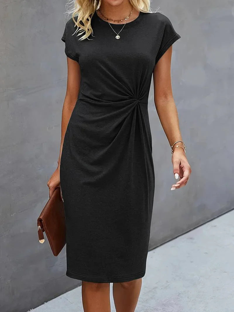Dames jurk met ronde hals en taille detail | Korte mouw en knielengte