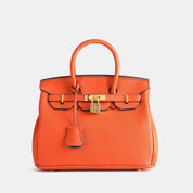 Dames handtas met goudkleurige details