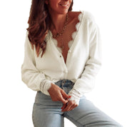 Dames cardigan met v-hals en kant afwerking