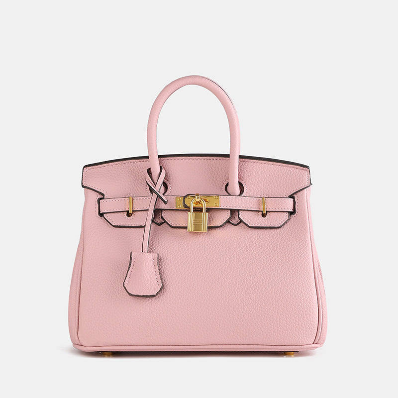 Dames handtas met goudkleurige details