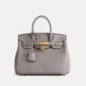 Dames handtas met goudkleurige details
