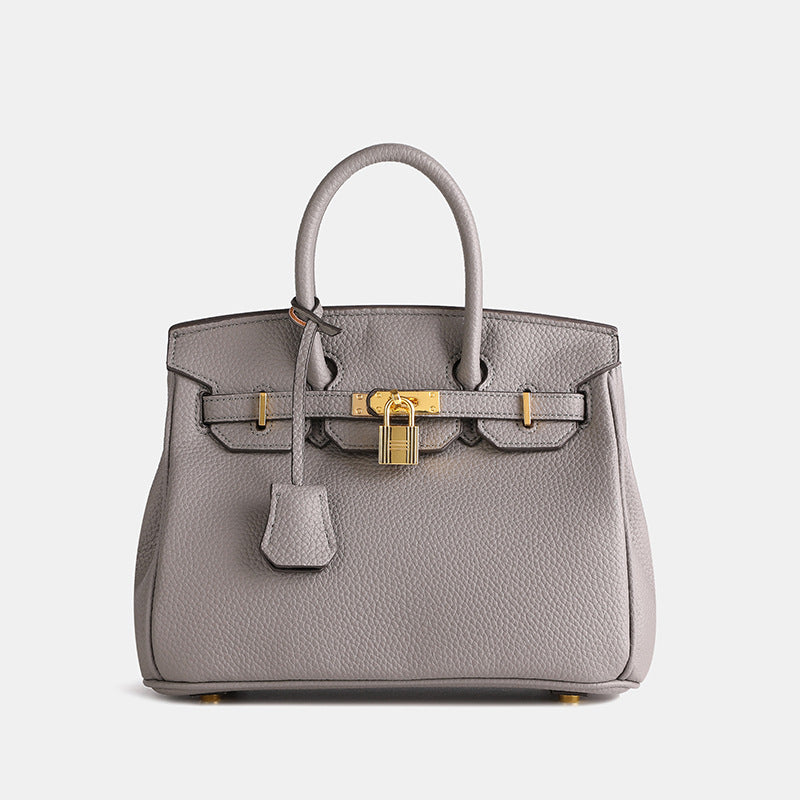 Dames handtas met goudkleurige details