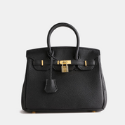Dames handtas met goudkleurige details