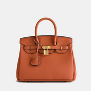 Dames handtas met goudkleurige details