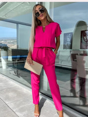 Dames zomerjumpsuit met V-hals en korte mouwen