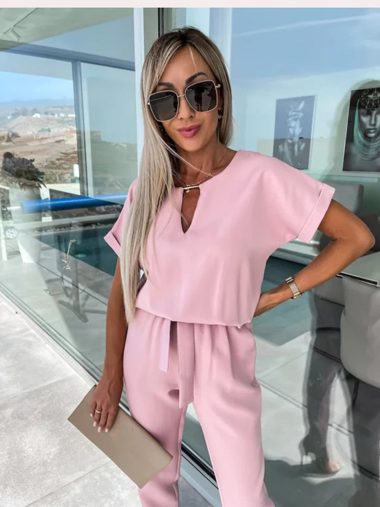 Dames zomerjumpsuit met V-hals en korte mouwen